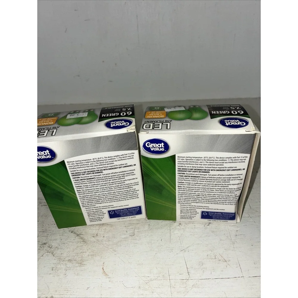 two packs of green great value LED 60 watt light bulbs A19 4 Bulbs NIB